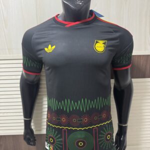 Adidas Jamaica 2026 x Bob Marley Away Replica Jersey black Reggae Boyz official replica kit front view showing striking black design with Bob Marley tribute details and Football Is Freedom inscription