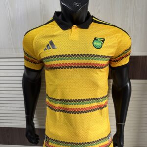 Adidas Jamaica 2026 x Bob Marley Home Authentic Jersey bold gold Reggae Boyz official kit front view showing iconic Bob Marley tribute design and authentic Jamaican football shirt